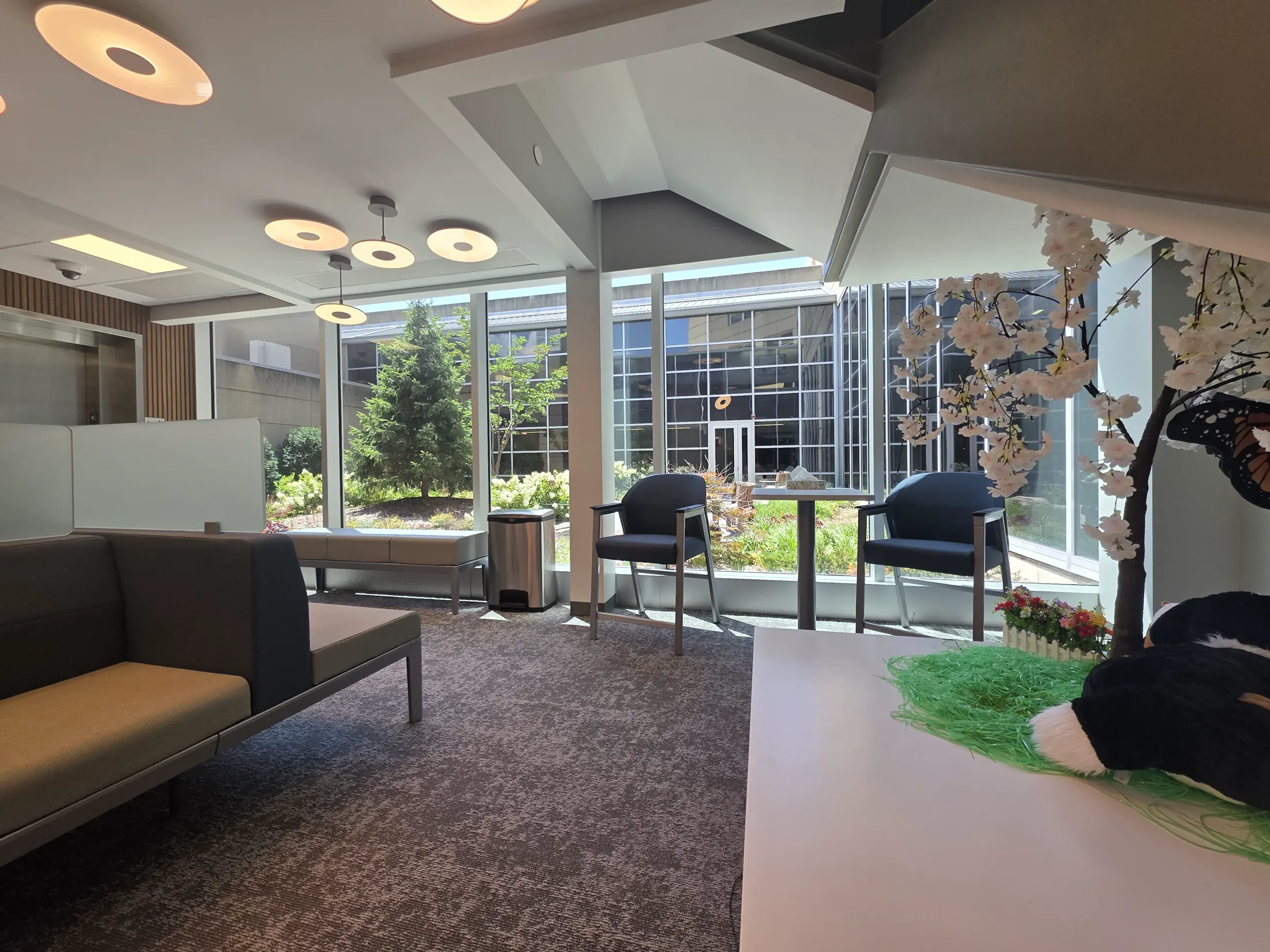 Completed waiting area at the St. Joseph Hospital Tower C Integrated Care Campus with daylight and pendant lighting